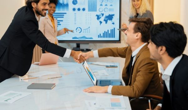 successful-businesspeople-shaking-hands.jpg